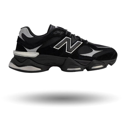 Black athletic shoe with gray accents on a white background