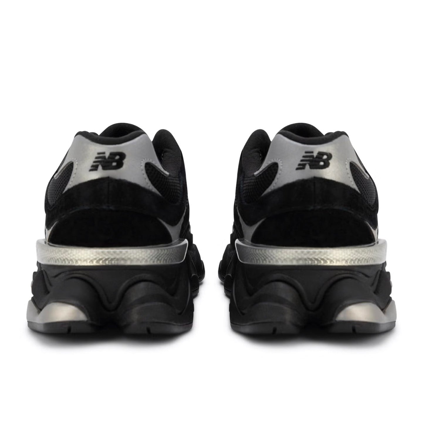 Black and silver New Balance sneakers on a white background
