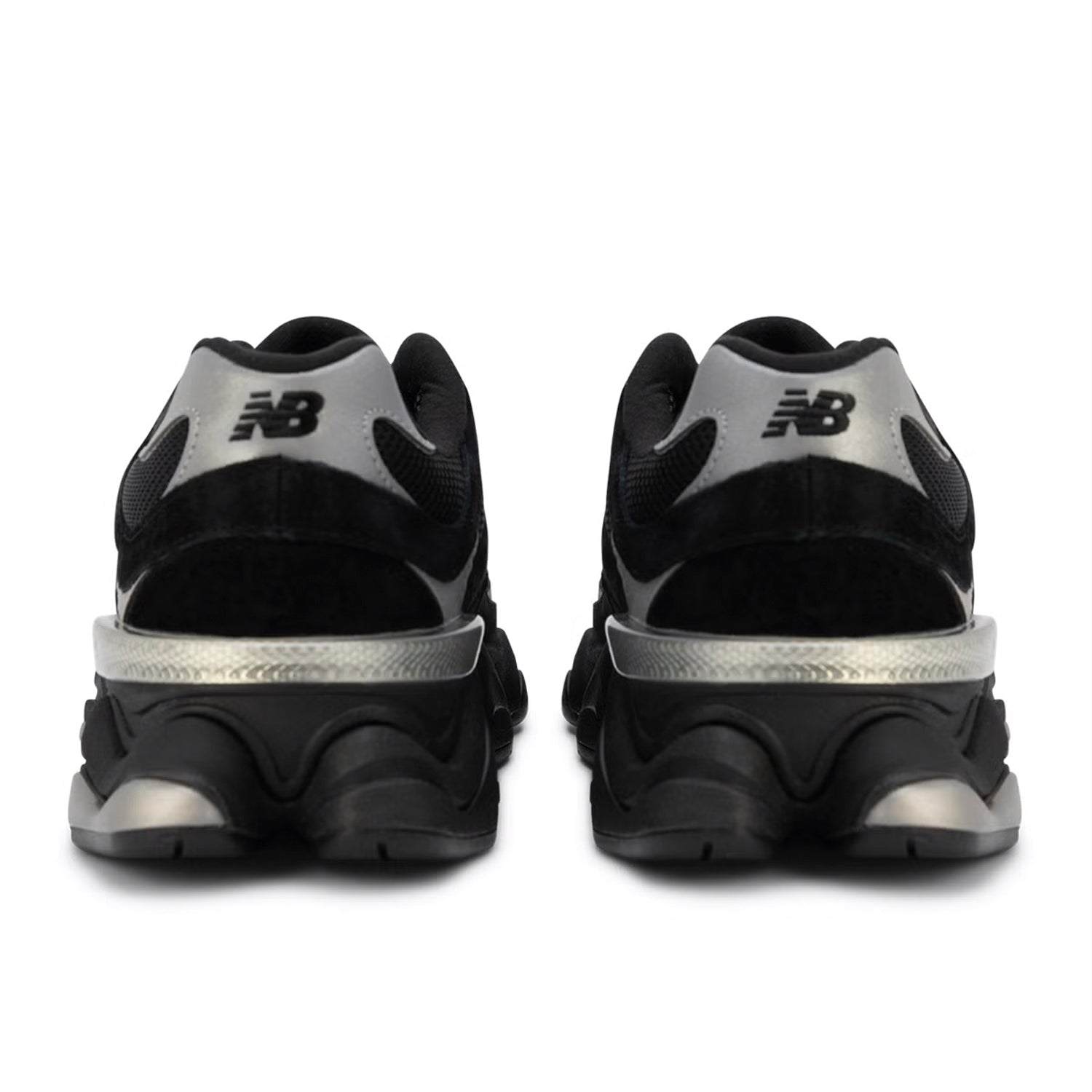 Black and silver New Balance sneakers on a white background
